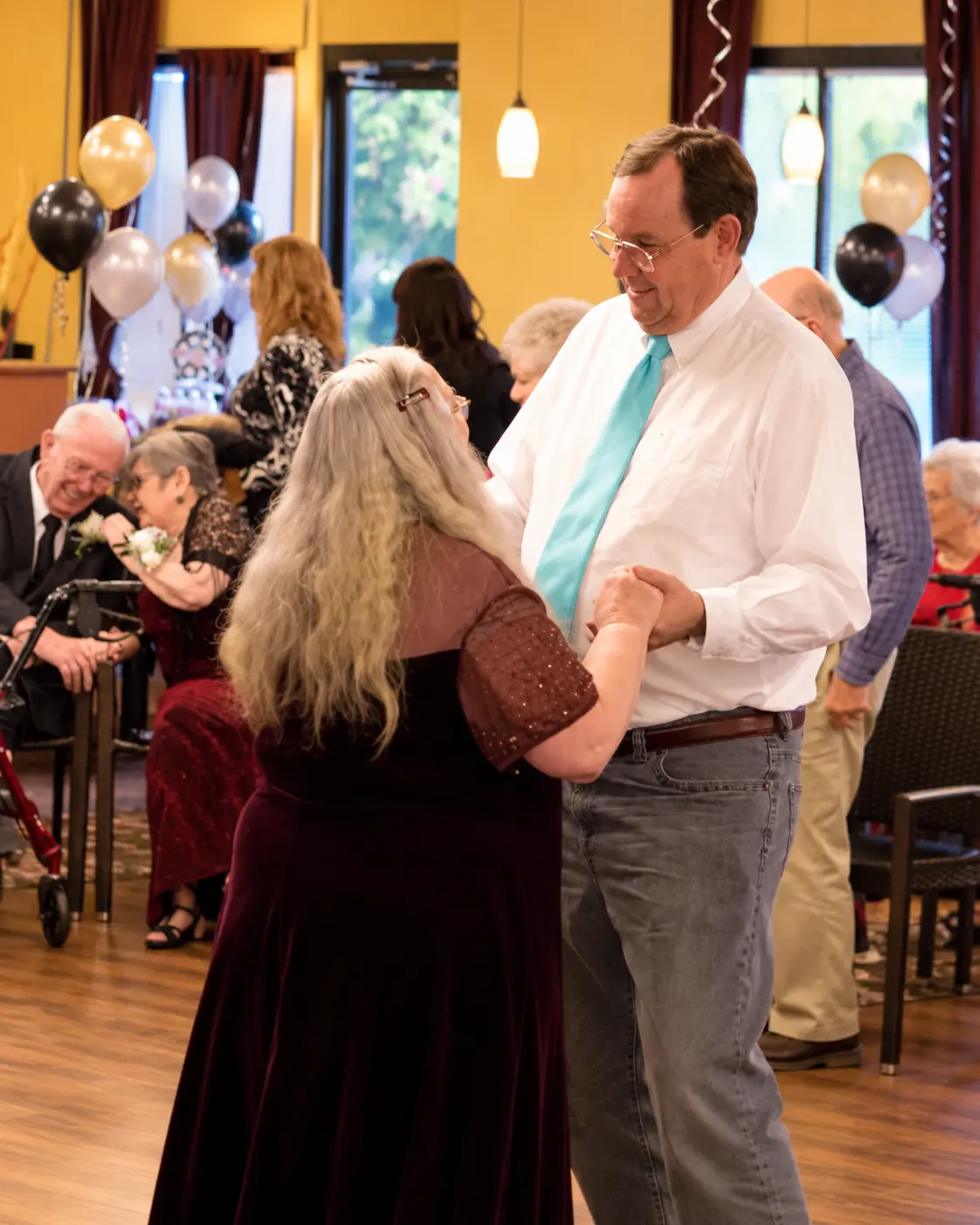 Residents dancing together at a Vista Montana celebration